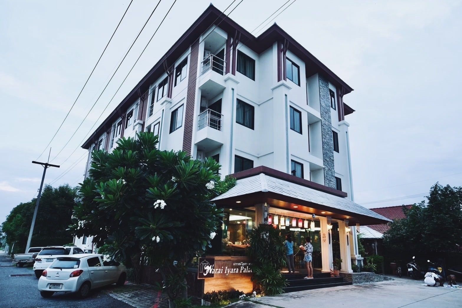 The hotel building and entrance at dusk